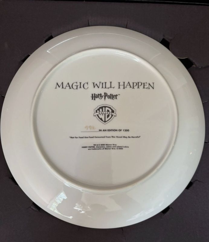 Warner Bros. Gallery “Magic Will Happen” Harry Potter holiday plate, back, reading “TM & © 2000 Warner Bros.”